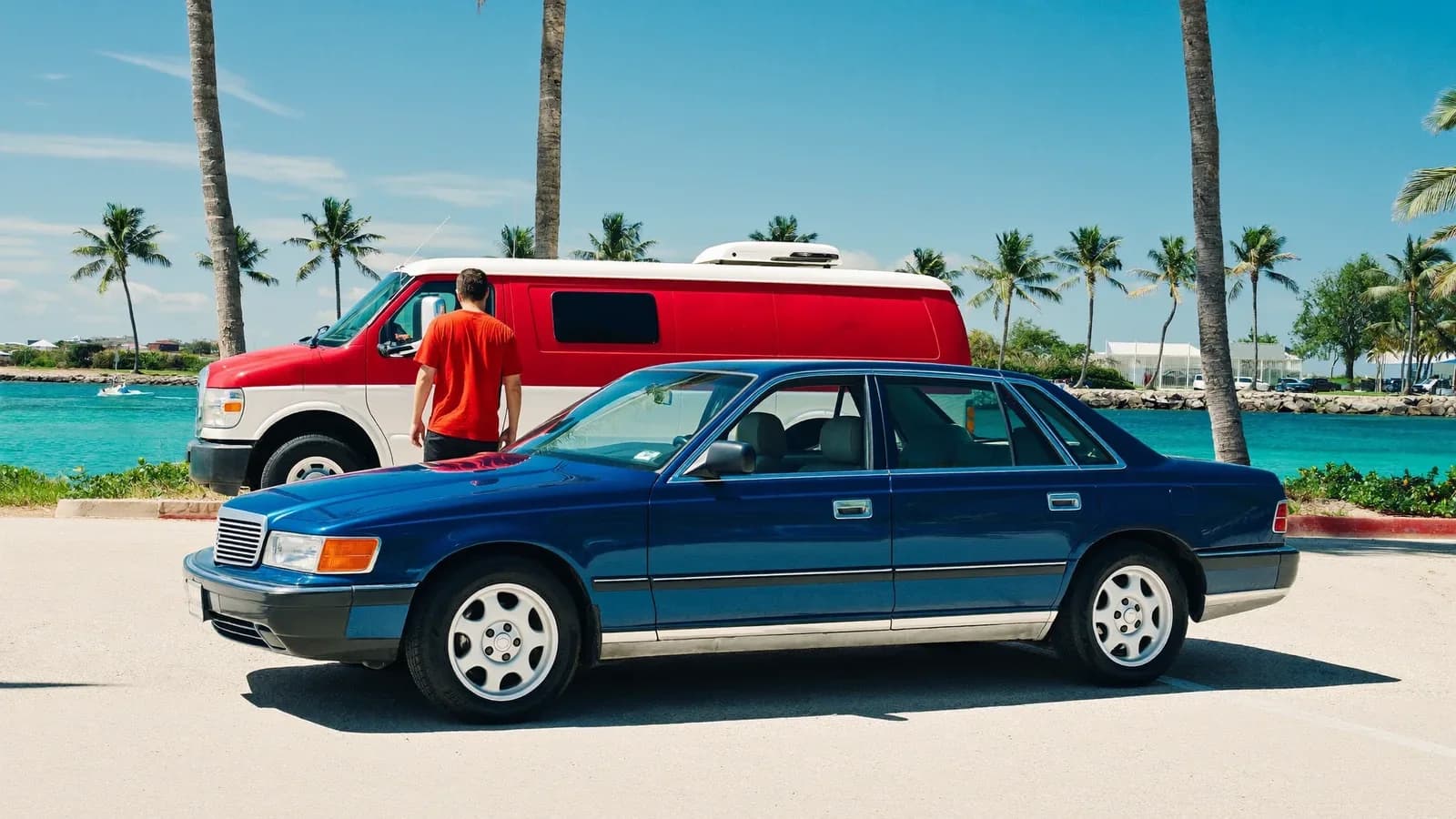 Clean sedan by the water for a Florida Keys car washing and rust prevention guide